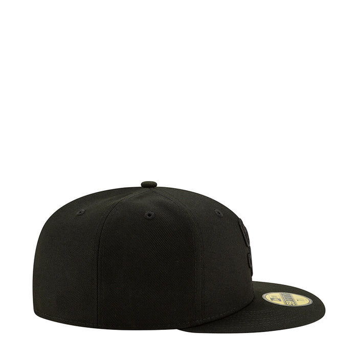 Black baseball cap, side view with small stitched logo