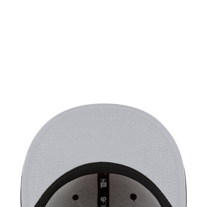 White baseball cap with textured crown and black inner brim