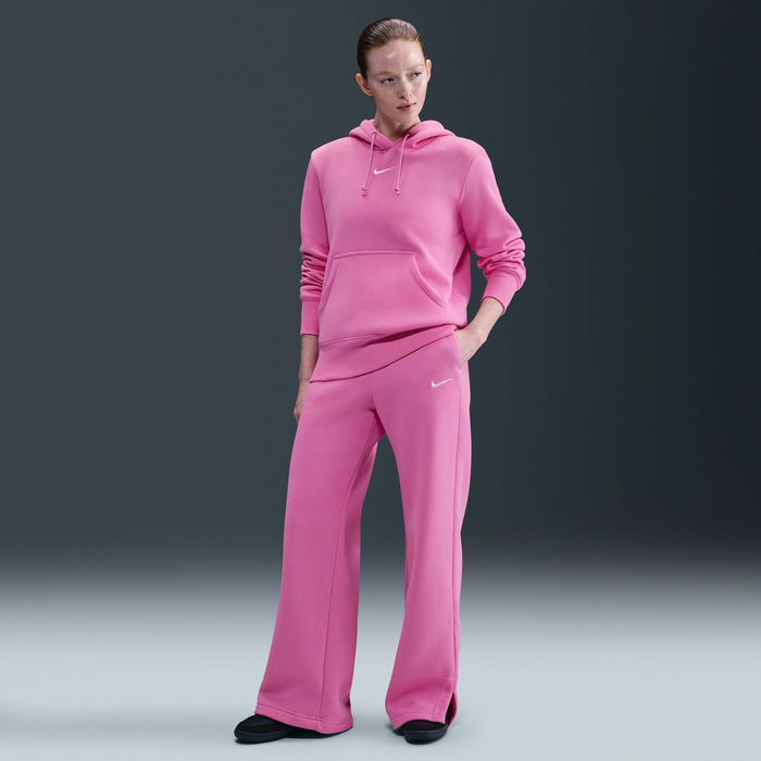 Pink fleece wide-leg pants on model, relaxed fit, drawstring elastic waist