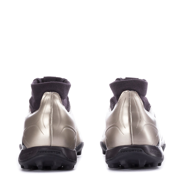 Men's mid-cut TF soccer cleats heel view, metallic silver with black trim and studs