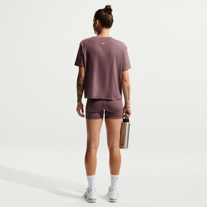 Women’s 3-inch performance shorts, dark mauve with small swoosh on back leg.