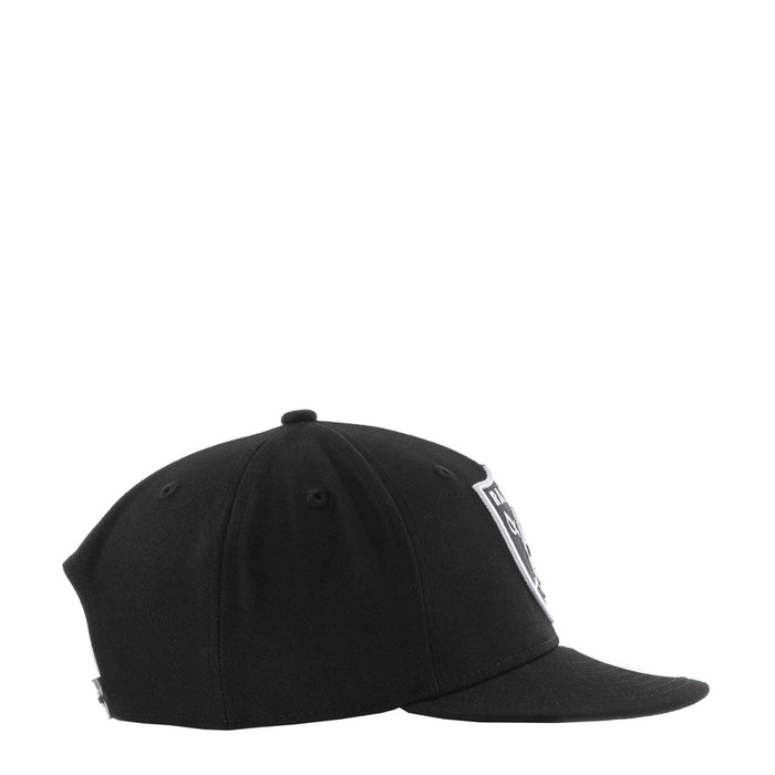 Black cap with curved brim and white Raiders lettering on the side panel