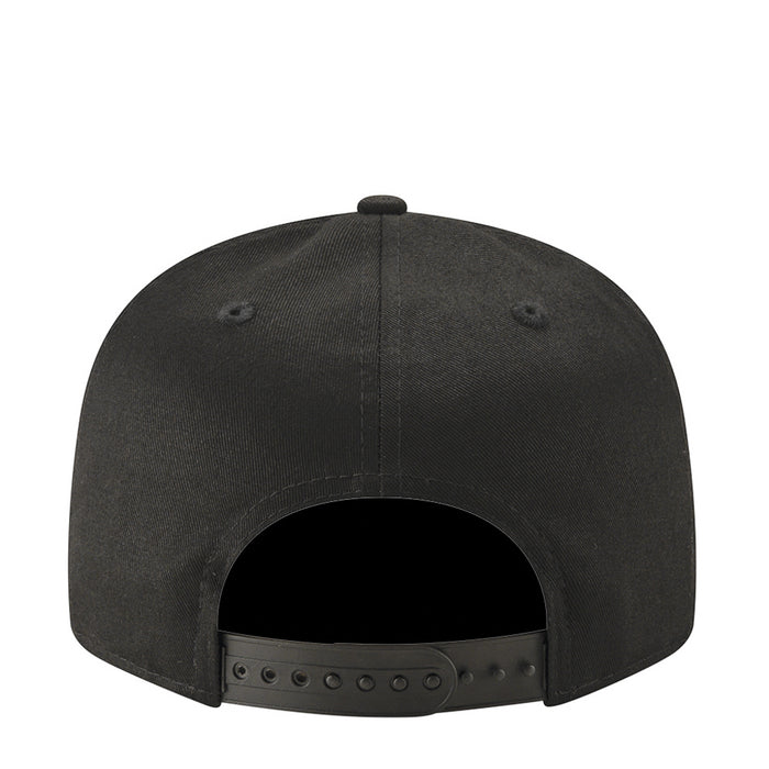 Black Raiders cap back view with vent eyelets and snapback strap