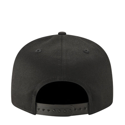 Black Raiders cap back view with vent eyelets and snapback strap