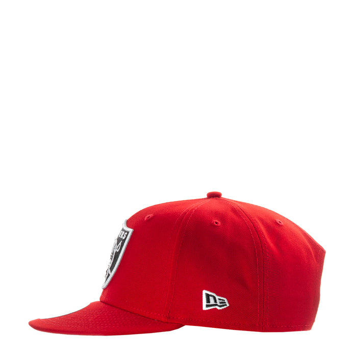 Red baseball cap angled view with New Era logo on side