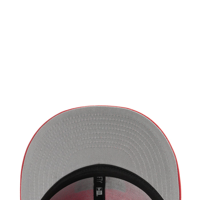 Gray cap brim underside with black band trim and stitched edge