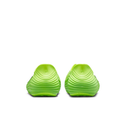 Pair of lime green clogs with ribbed heel and textured outsole