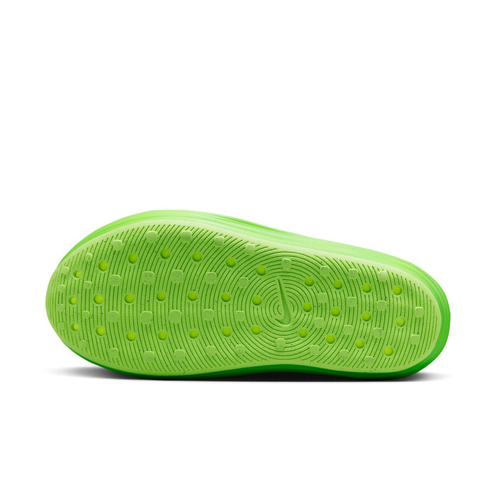 Lime green outsole with traction nubs and circular tread pattern
