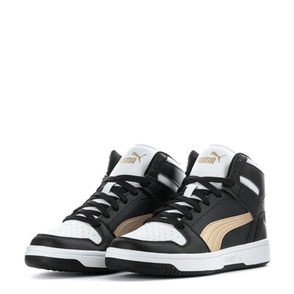 Youth high-top sneakers pair, black and white with gold side panels and Puma logos
