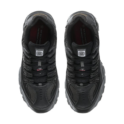 Pair of men's black steel-toe sneakers, front view of lace-up uppers and padded tongue