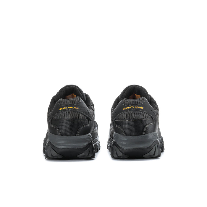 Men's black steel-toe sneakers, back view with pull tab and cushioned heel