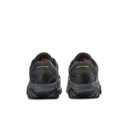 Men's black steel-toe sneakers, back view with pull tab and cushioned heel