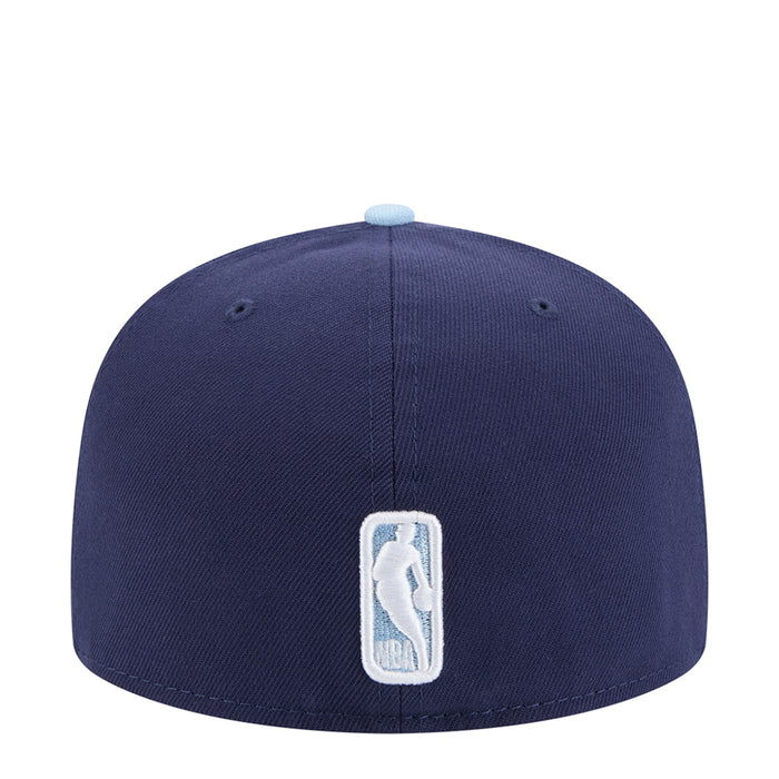 Two-tone cap in dark navy with light blue brim, embroidered Rockets mascot patch.