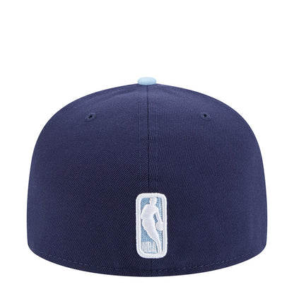 Two-tone cap in dark navy with light blue brim, embroidered Rockets mascot patch.