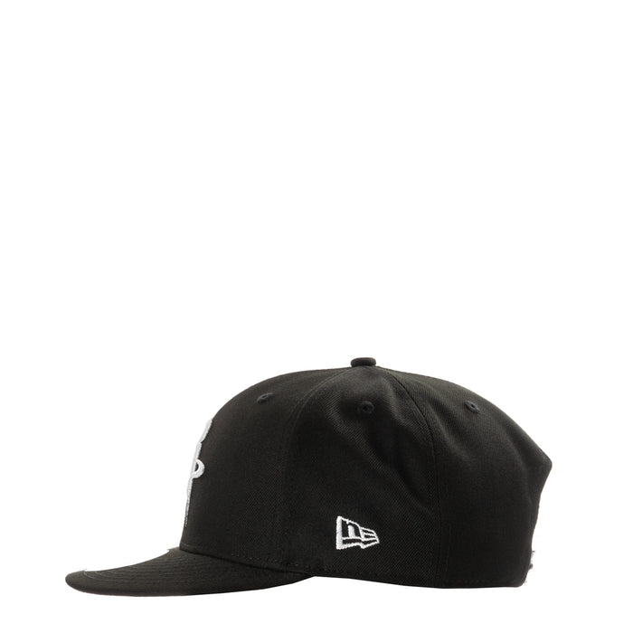 Black baseball cap with New Era logo on front panel, curved brim