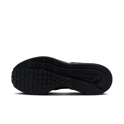 Black rubber outsole with raised tread pattern for traction