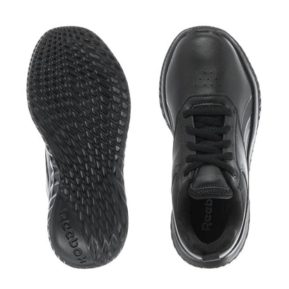 Black kids sneaker outsole tread and lace-up upper with Reebok label inside