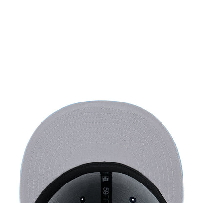Two-tone baseball cap panel close-up with light silver fabric and black underside