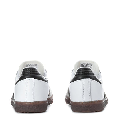 Kids white sneakers from the back with black heel panel and brown rubber sole