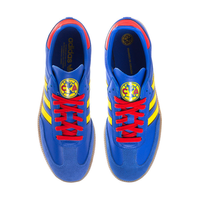 Men's blue sneakers with red lace-up, yellow stripes and Club America crest on tongue