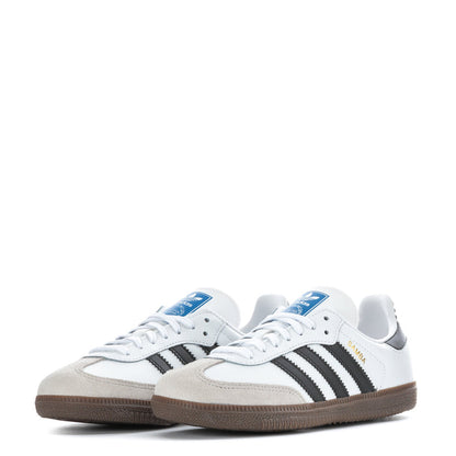Pair of kids' white sneakers with black stripes and gum-brown textured soles