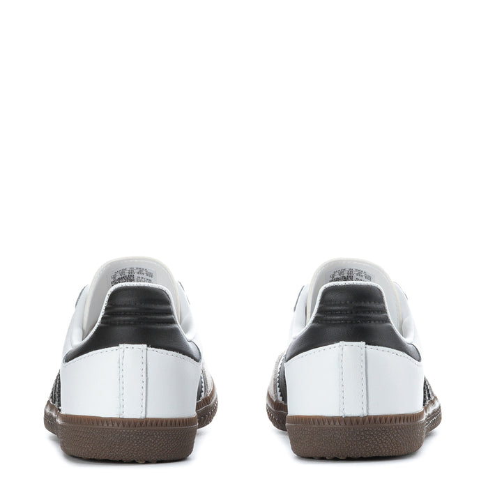 Kids' sneaker heel view with white upper, black collar trim, and gum-brown sole