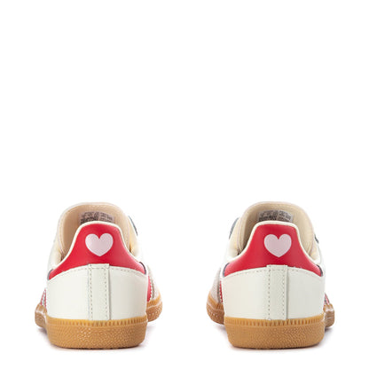 Kids cream sneakers with red heel lining and heart detail, gum outsole