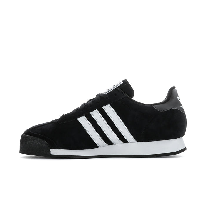 Black suede low-top sneaker with white three stripes, black laces, and white sole