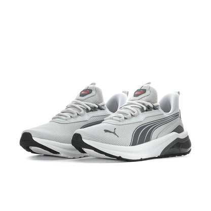 Pair of men's grey Puma lace-up running sneakers with mesh texture and white midsole