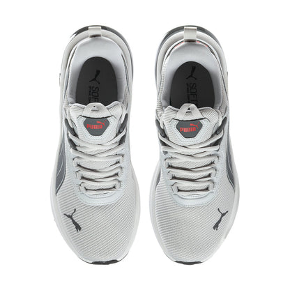 Men's grey Puma lace-up sneakers, front view with padded collar and mesh upper