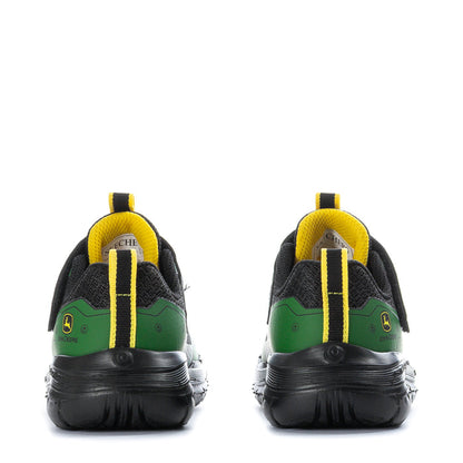 Toddler sneaker rear view, yellow collar loops, green back panel, black rubber sole.