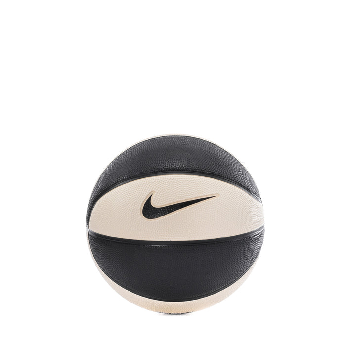 Mini basketball with black and pale ivory panels, Nike swoosh on center
