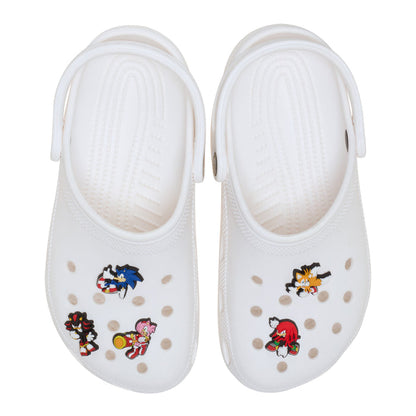 White clogs with five Sonic character Jibbitz charms attached