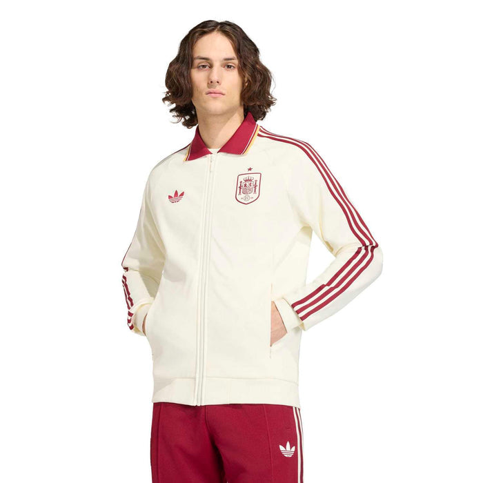 Men's off-white zip-up jacket with burgundy collar, chest crest patch, 3-stripe sleeves