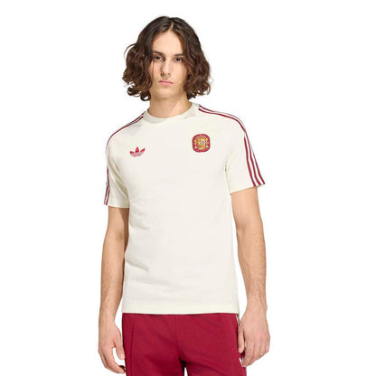Men's off-white T-shirt with adidas trefoil and Spain crest, maroon shoulder stripes.