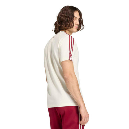 Men's off-white T-shirt with maroon three-stripe sleeves, rear/side view.