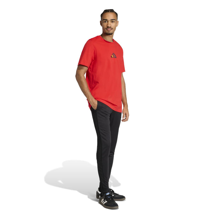 Men's red short-sleeve tee with small chest graphic, side view