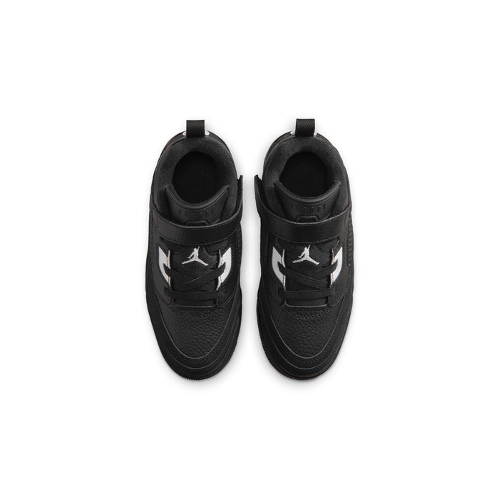 Kids black low-top sneakers with side logos, lace-up style, open tongue view