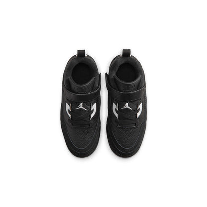 Kids black low-top sneakers with side logos, lace-up style, open tongue view