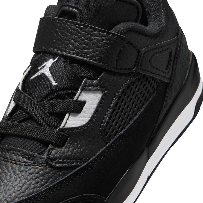 Kids black sneaker upper close-up with Jordan logo, perforated panel, lace-up