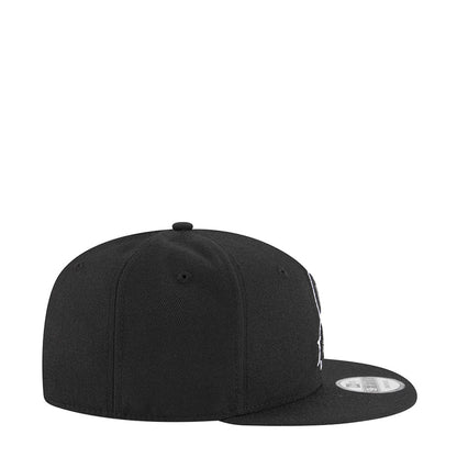 Black snapback cap, plain back with curved brim