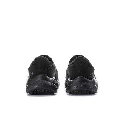 Men's black slip-on sneakers, rear view with heel pull tab and logo