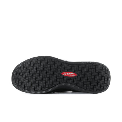 Men's black slip-on sneakers outsole with textured tread and red logo patch