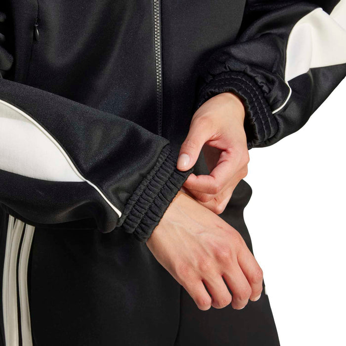 Black womens stadium tracktop with full-zip front and elastic cuff details.
