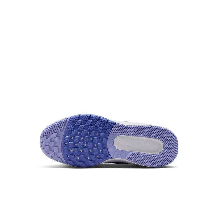 Kids white and blue sneaker outsole with traction tread and light gray midsole
