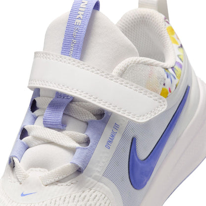 Kids white running shoe upper close-up with blue swoosh and lace detail