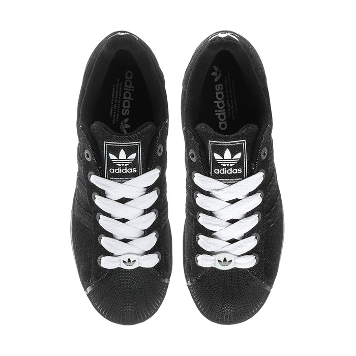 Black adidas sneakers with white laces and tongue logo, front view of both shoes