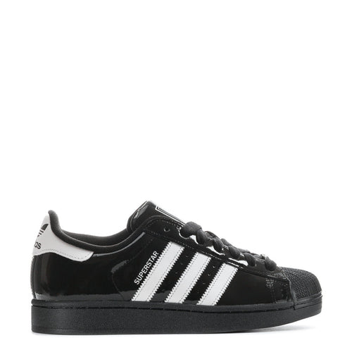 Youth low-top sneakers in black patent with white triple stripes and black laces