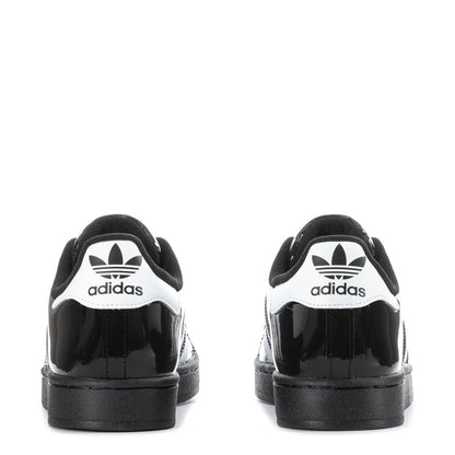 Youth low-top sneakers with adidas logo at heel and black patent back panel