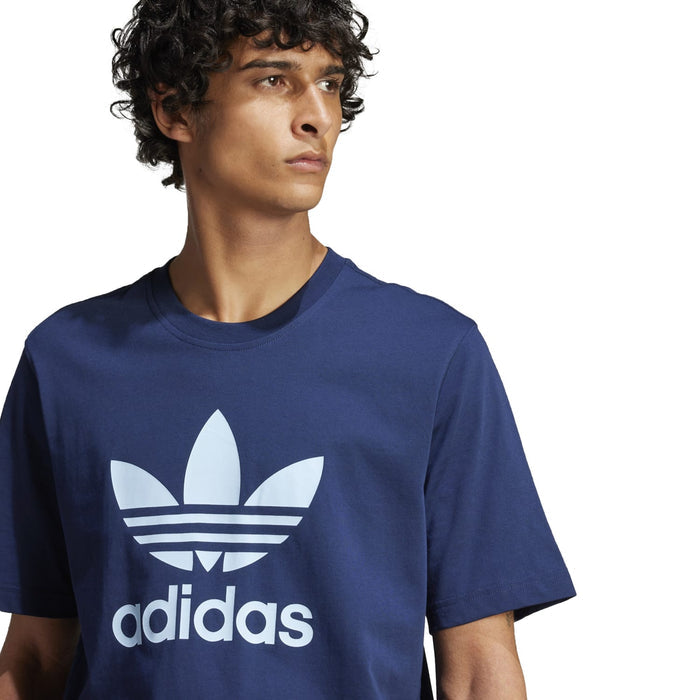 Men's navy trefoil graphic T-shirt close-up, adidas trefoil and wordmark